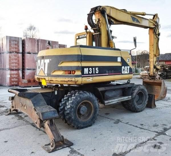CAT M 315 Gumikerekes kotrók