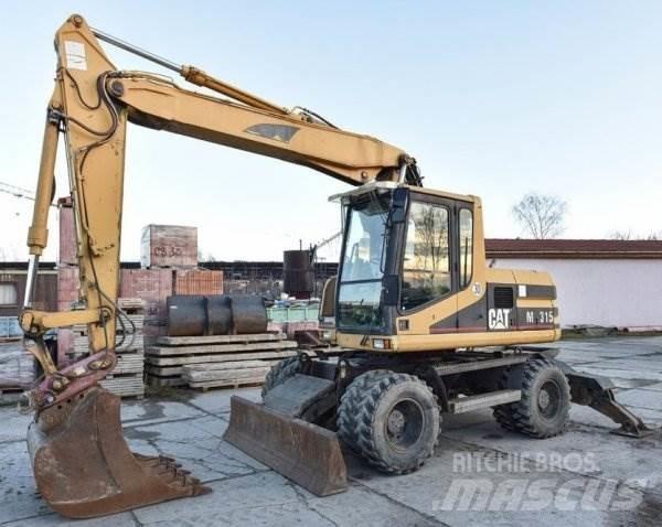 CAT M 315 Gumikerekes kotrók