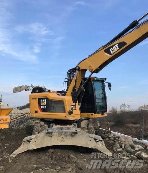 CAT M317 F Gumikerekes kotrók