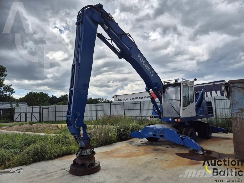 Fuchs MHL 331 Gumikerekes kotrók