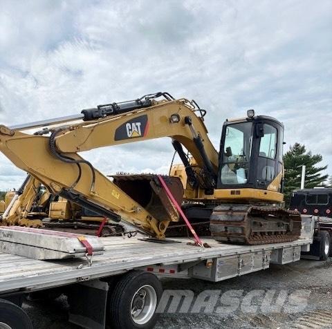 CAT 313 D Gumikerekes kotrók