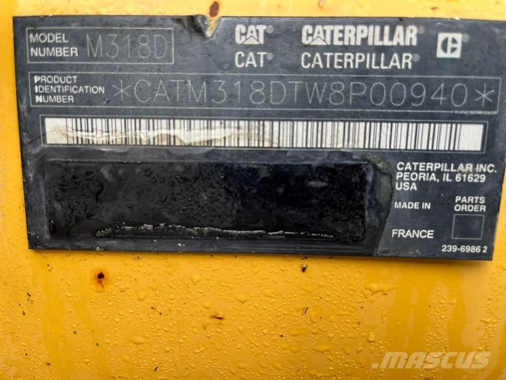 CAT M 318 D Gumikerekes kotrók