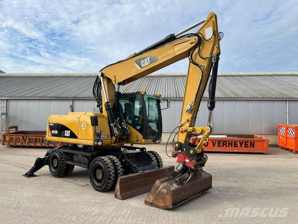CAT M 318 D Gumikerekes kotrók