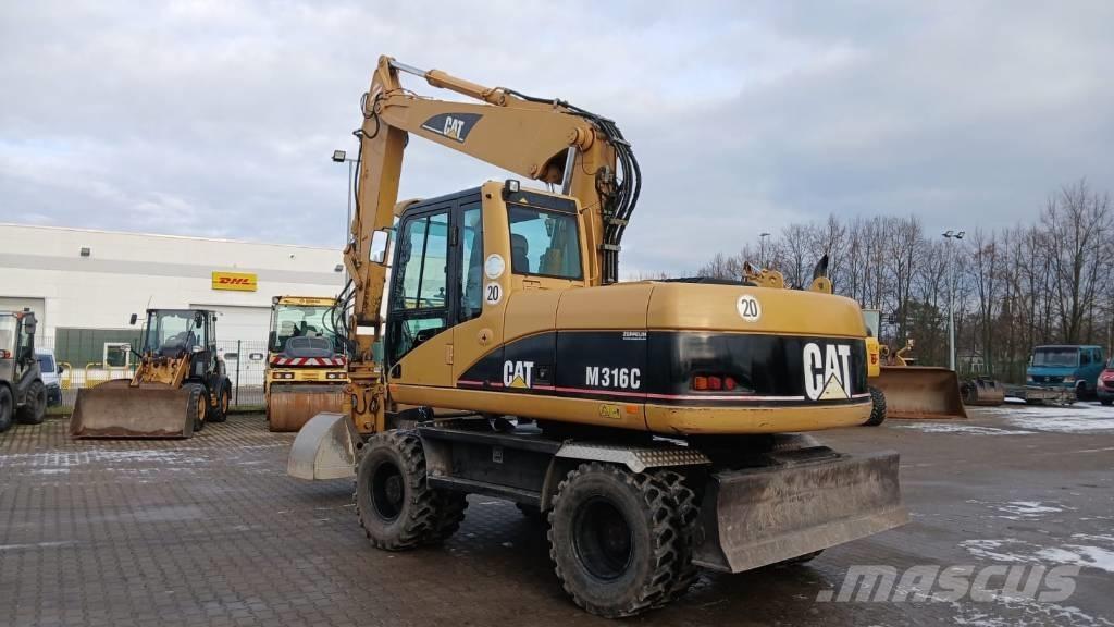 CAT M 316 C Gumikerekes kotrók