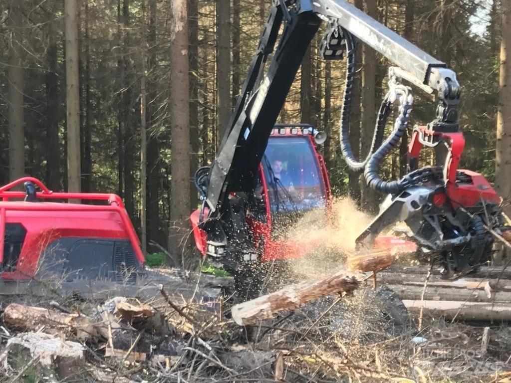 Komatsu 931XC Betakarítók