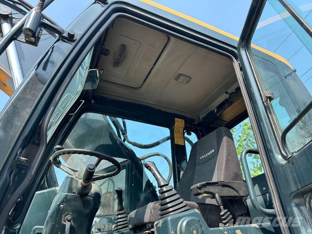 Hyundai 210W-9 Gumikerekes kotrók