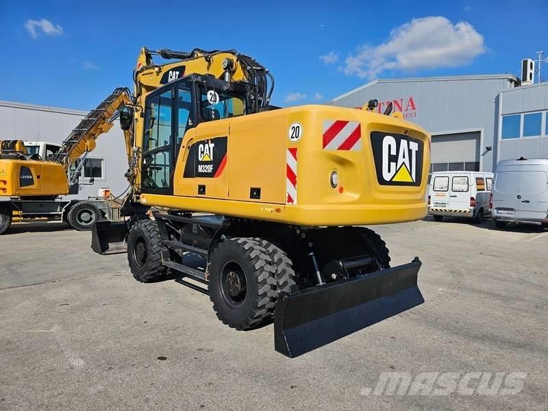 CAT M320F Gumikerekes kotrók