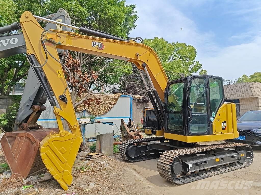 CAT 310 Lánctalpas kotrók