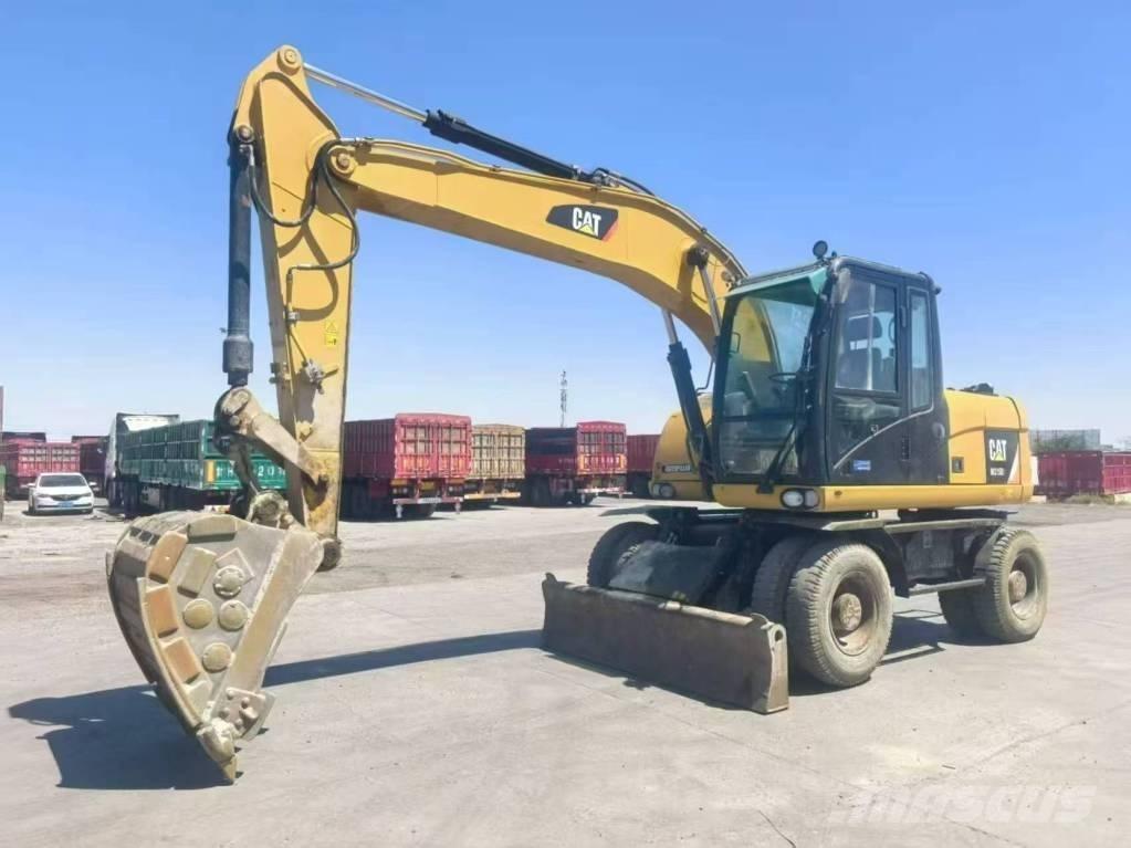 CAT M315D2 Gumikerekes kotrók