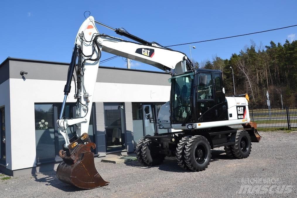 CAT M 313 D Gumikerekes kotrók