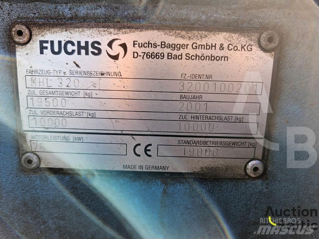 Fuchs MHL 320 Gumikerekes kotrók