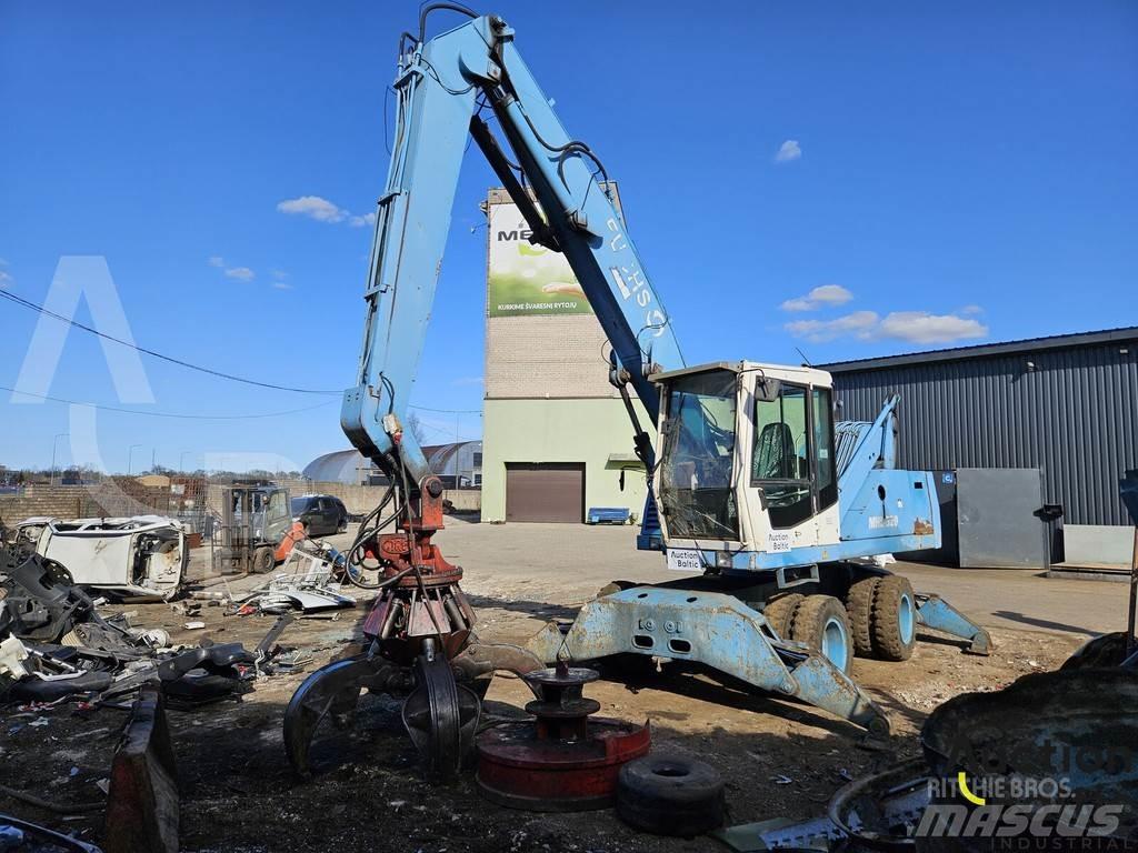 Fuchs MHL 320 Gumikerekes kotrók