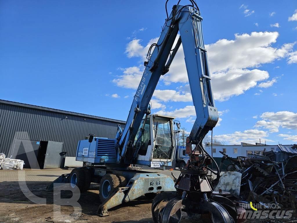 Fuchs MHL 320 Gumikerekes kotrók