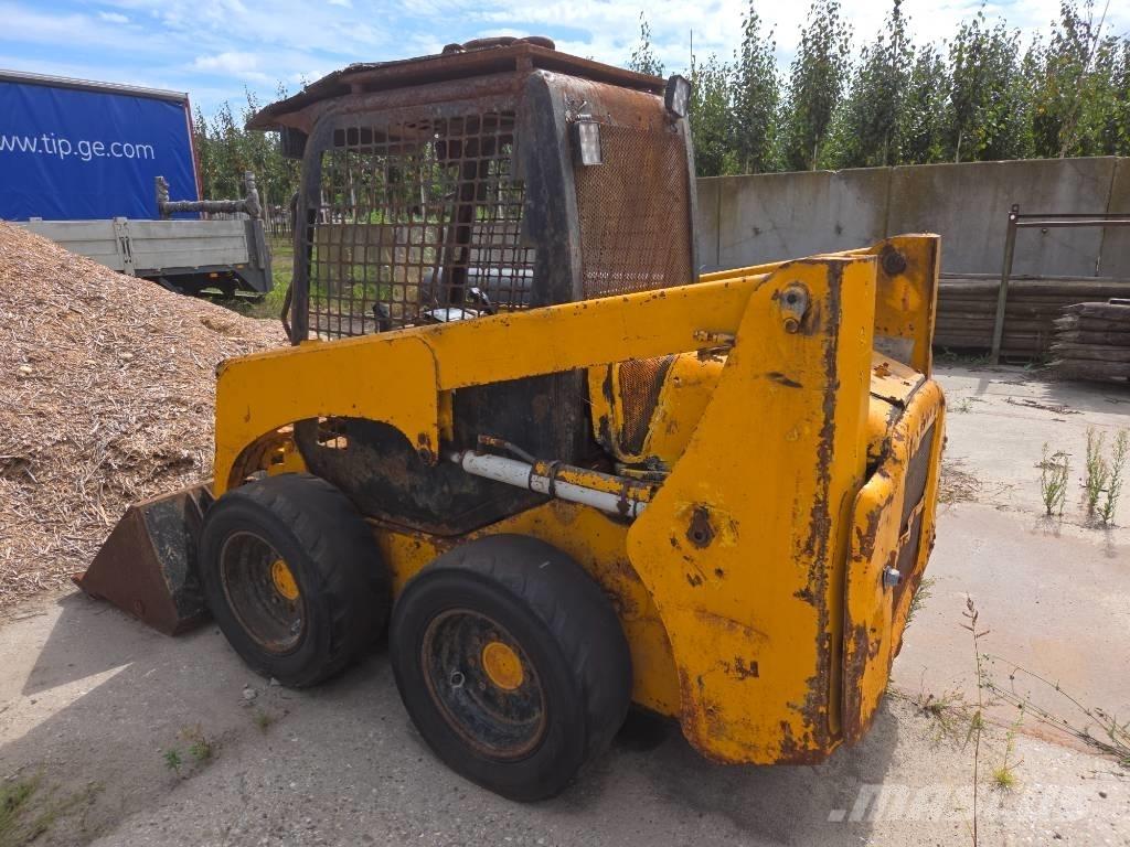Komatsu SK 714 Kompaktrakodók