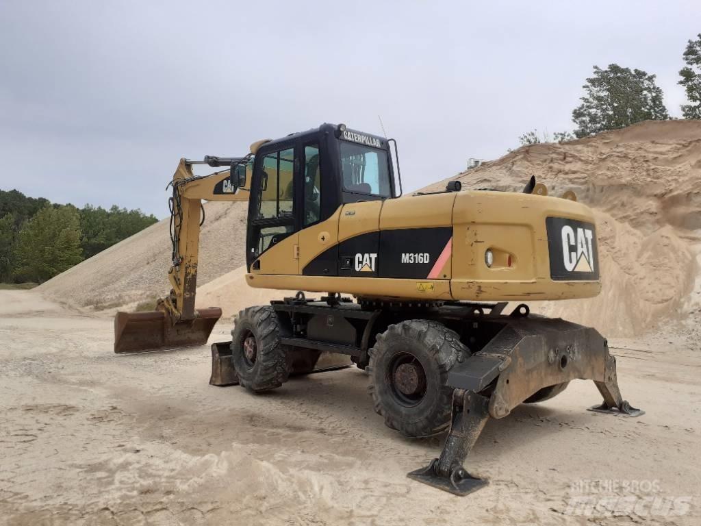 CAT M 316 D Gumikerekes kotrók