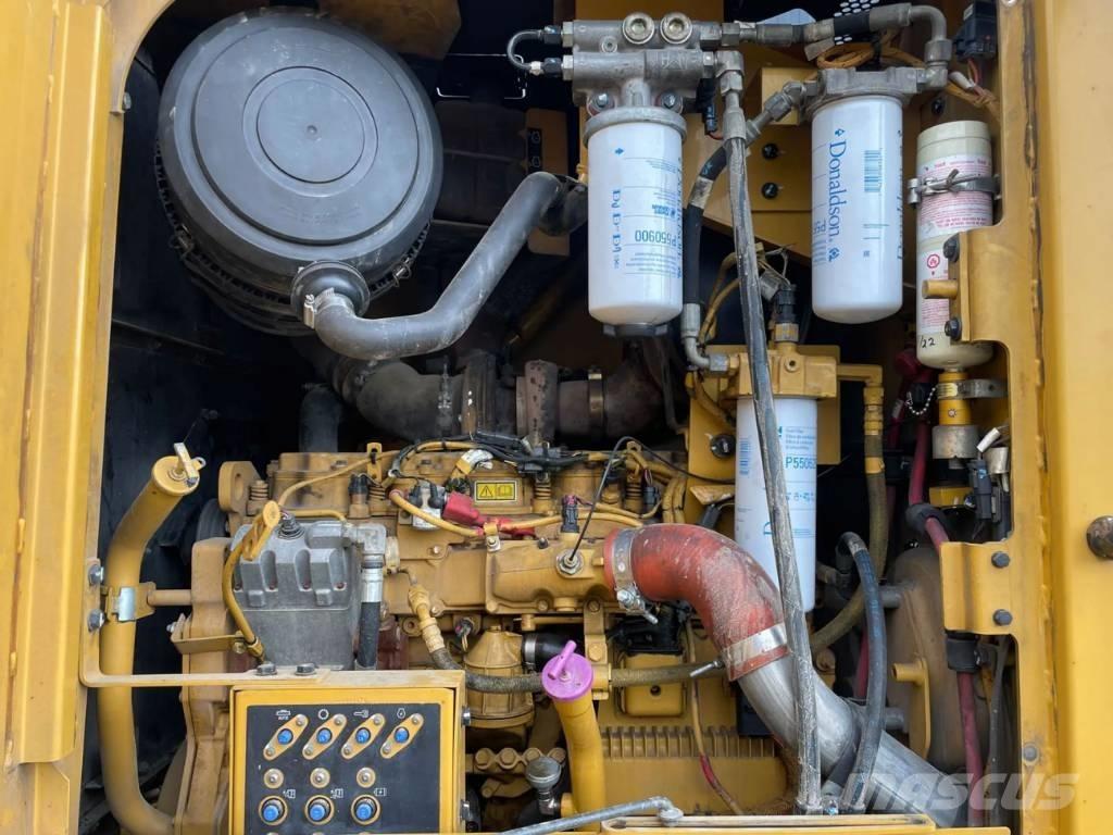CAT 140M Gréderek