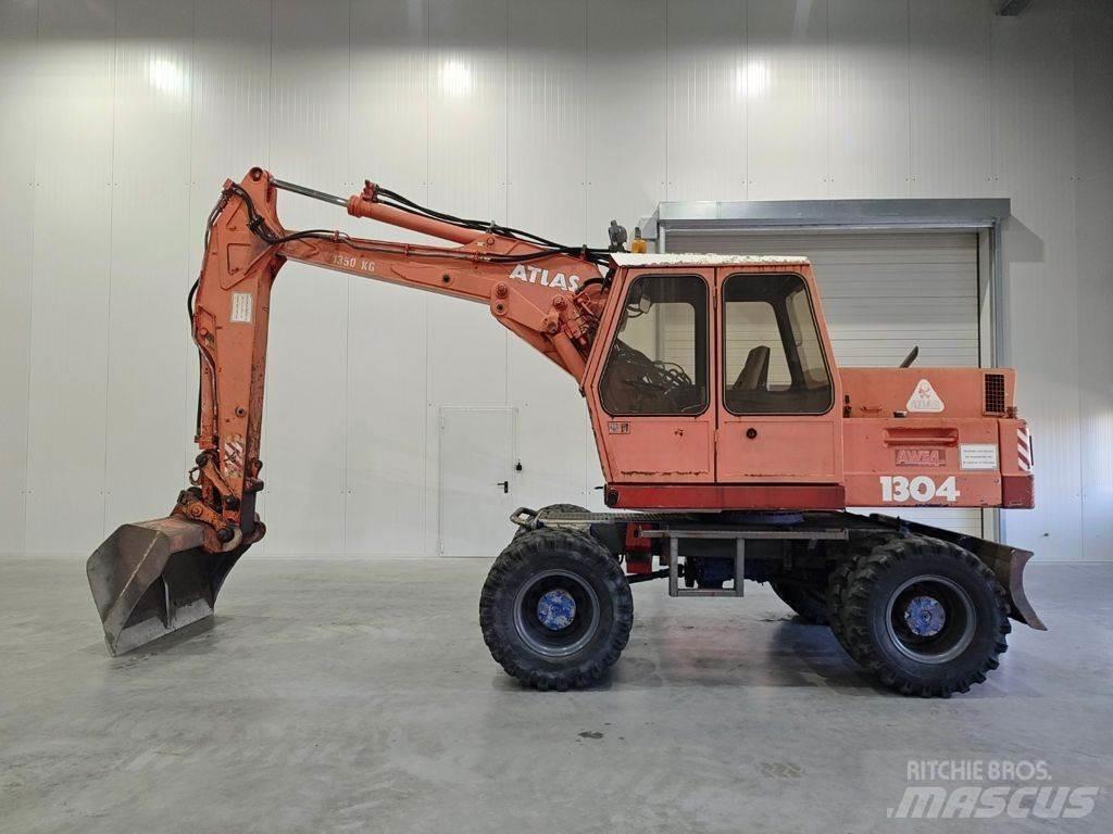 Atlas 1304 Gumikerekes kotrók