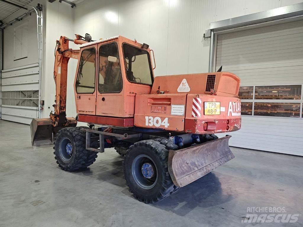 Atlas 1304 Gumikerekes kotrók