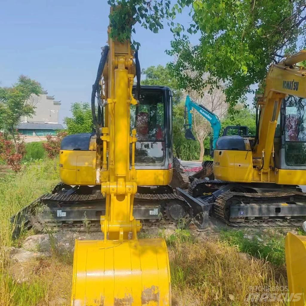 Komatsu PC 78 US Közepes (midi) kotrók 7 t - 12 t