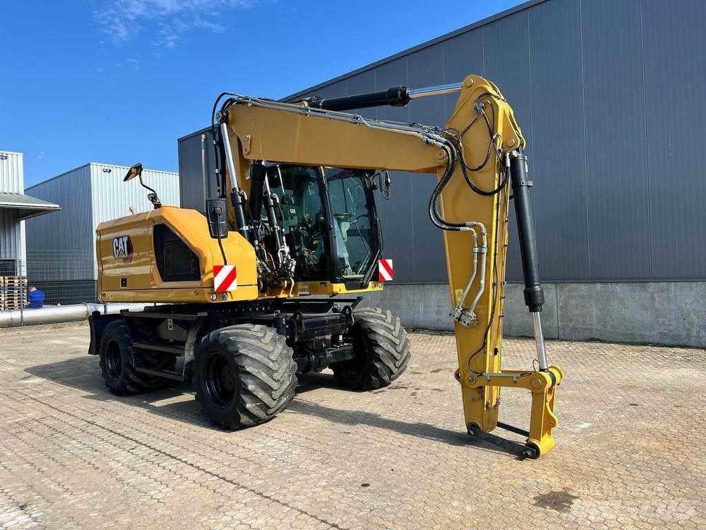 CAT M318-07 Gumikerekes kotrók