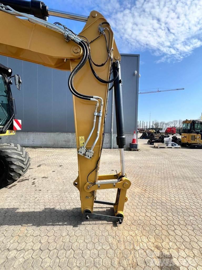 CAT M318-07 Gumikerekes kotrók