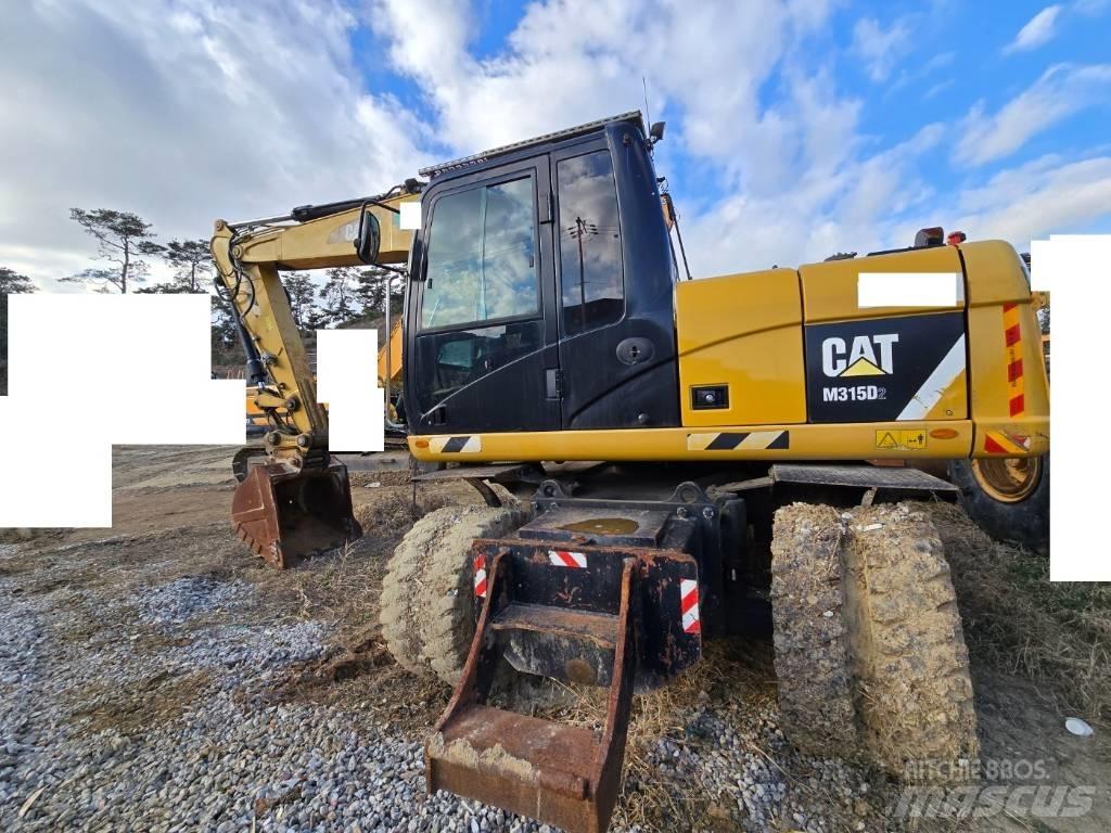 CAT M 315 D Gumikerekes kotrók