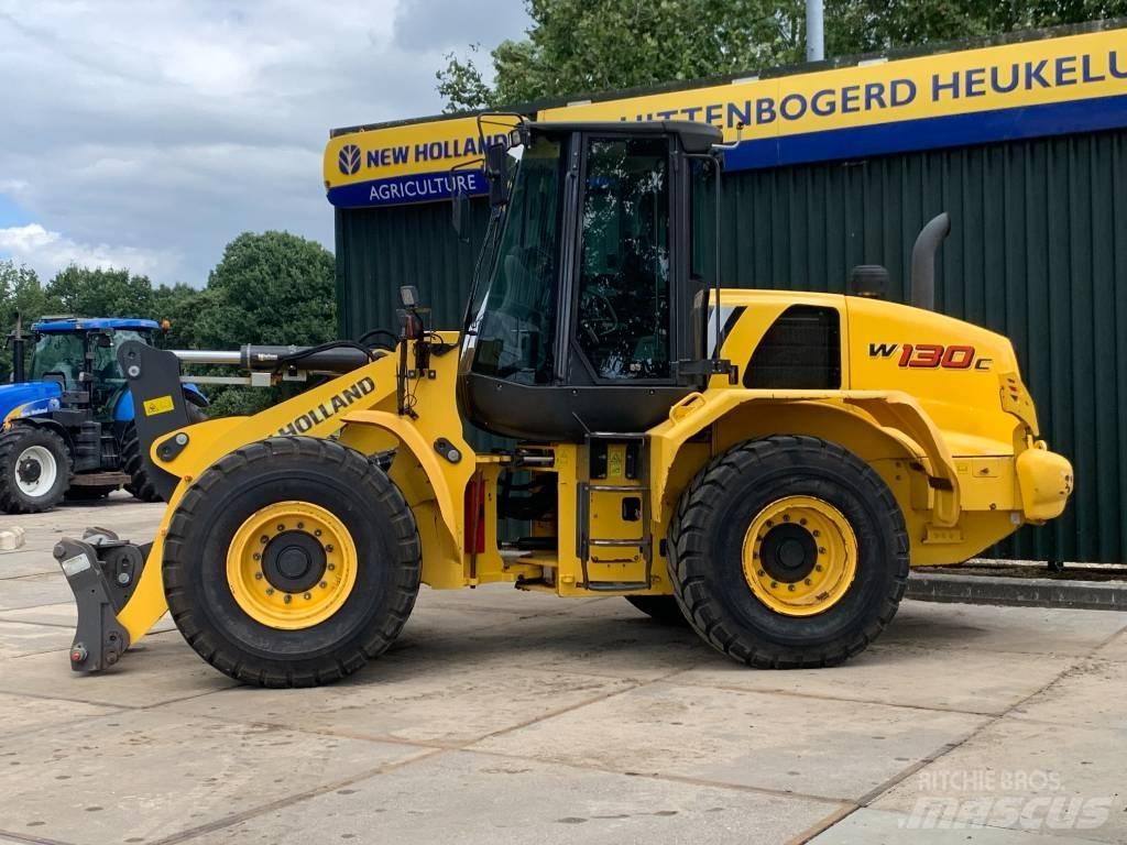 New Holland W 130 C Gumikerekes homlokrakodók