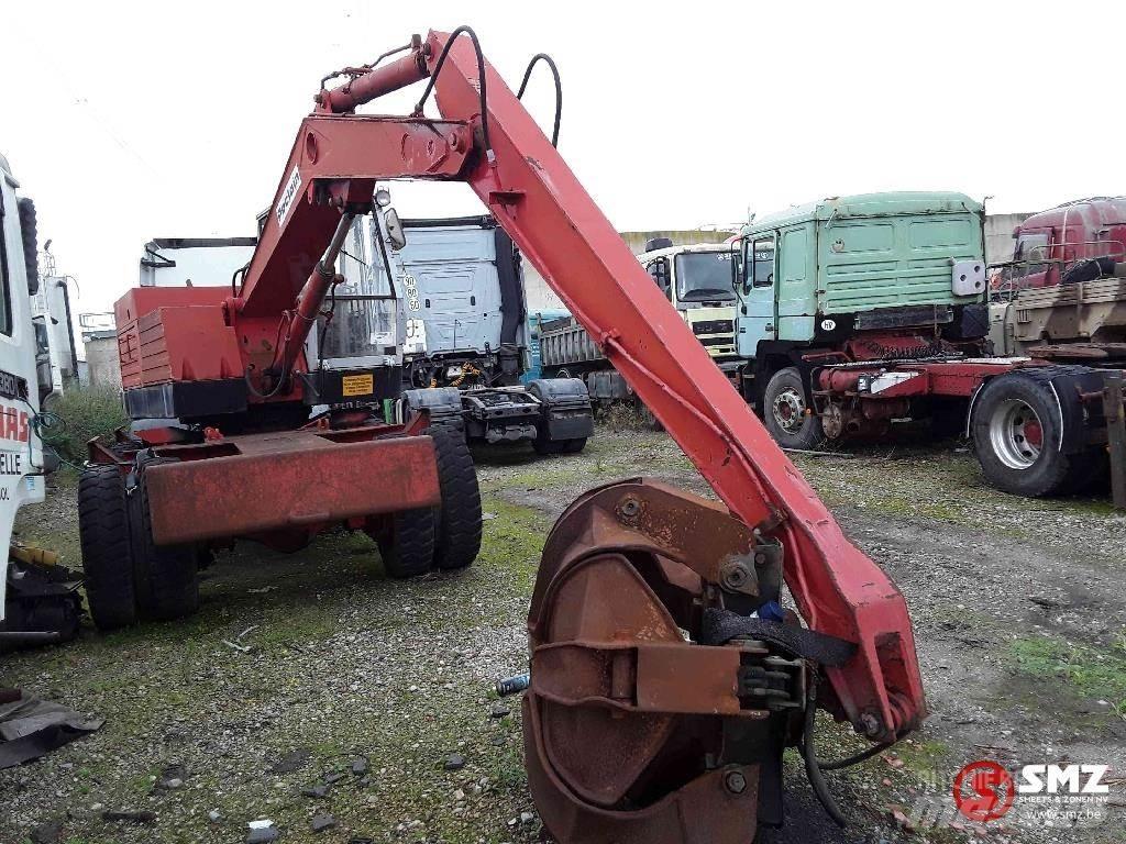 Poclain Machine Gumikerekes homlokrakodók