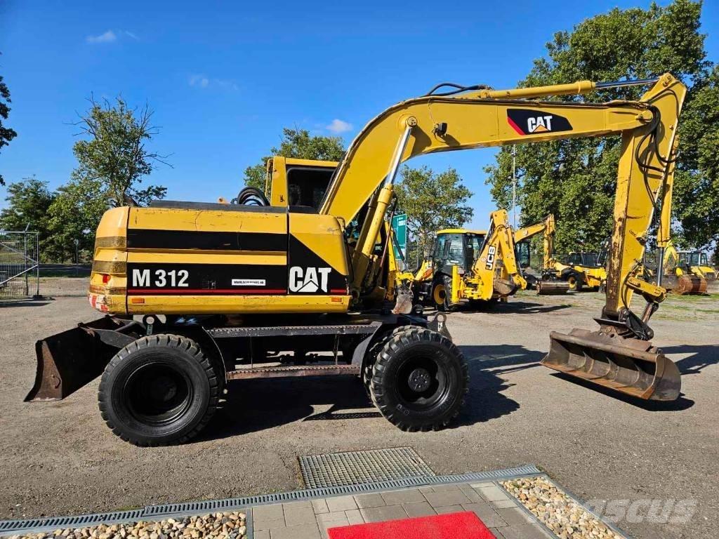 CAT M 312 Gumikerekes kotrók