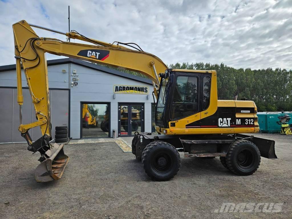 CAT M 312 Gumikerekes kotrók