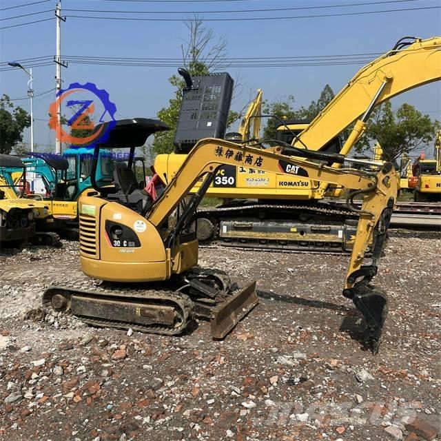 CAT 303 Mini kotrók < 7t