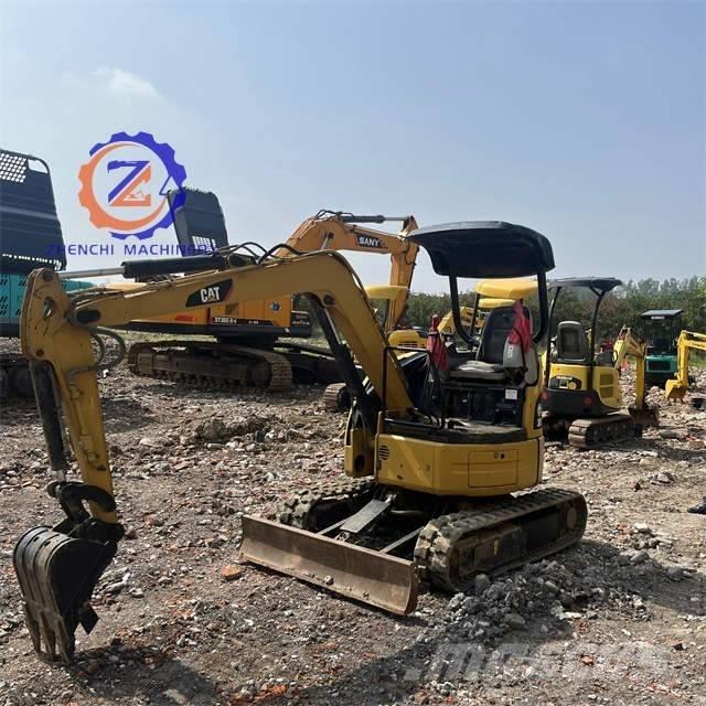 CAT 303 Mini kotrók < 7t