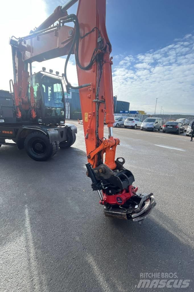 Hitachi ZX 140 W-5B Gumikerekes kotrók