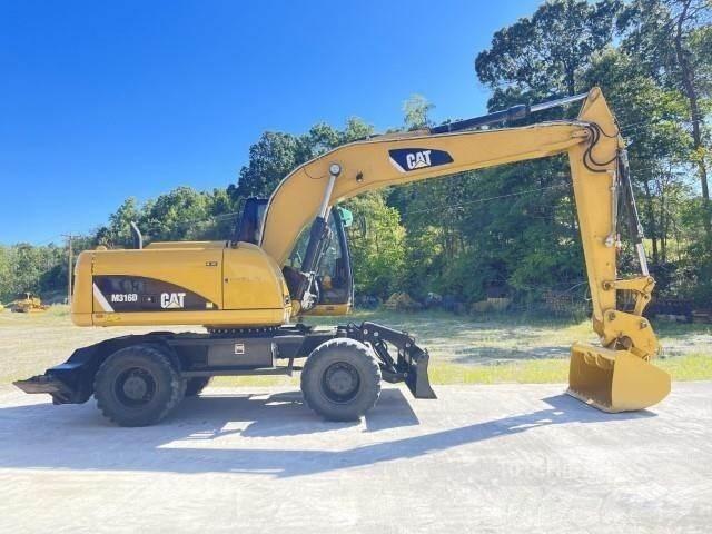 CAT M316D Gumikerekes kotrók