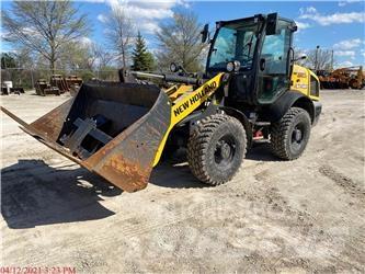 New Holland W80C Gumikerekes homlokrakodók