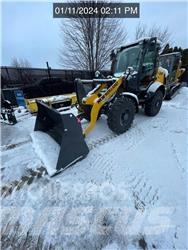 New Holland W80C Gumikerekes homlokrakodók