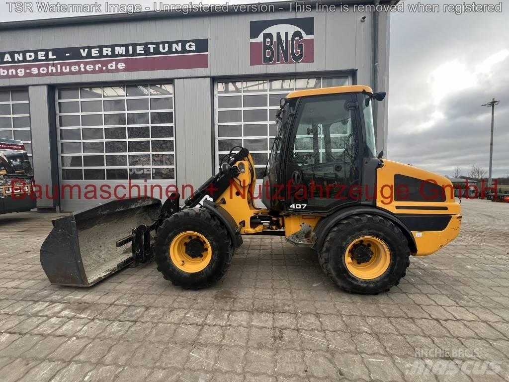 JCB 407 -gebraucht- Gumikerekes homlokrakodók