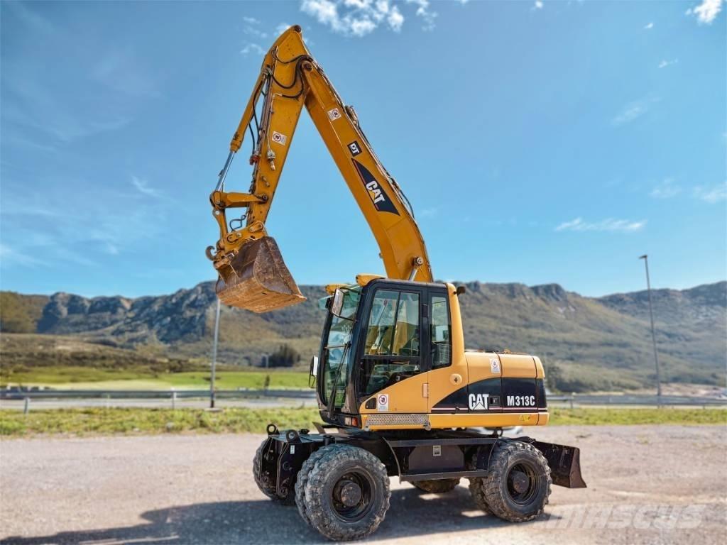 CAT M 313 C Gumikerekes kotrók