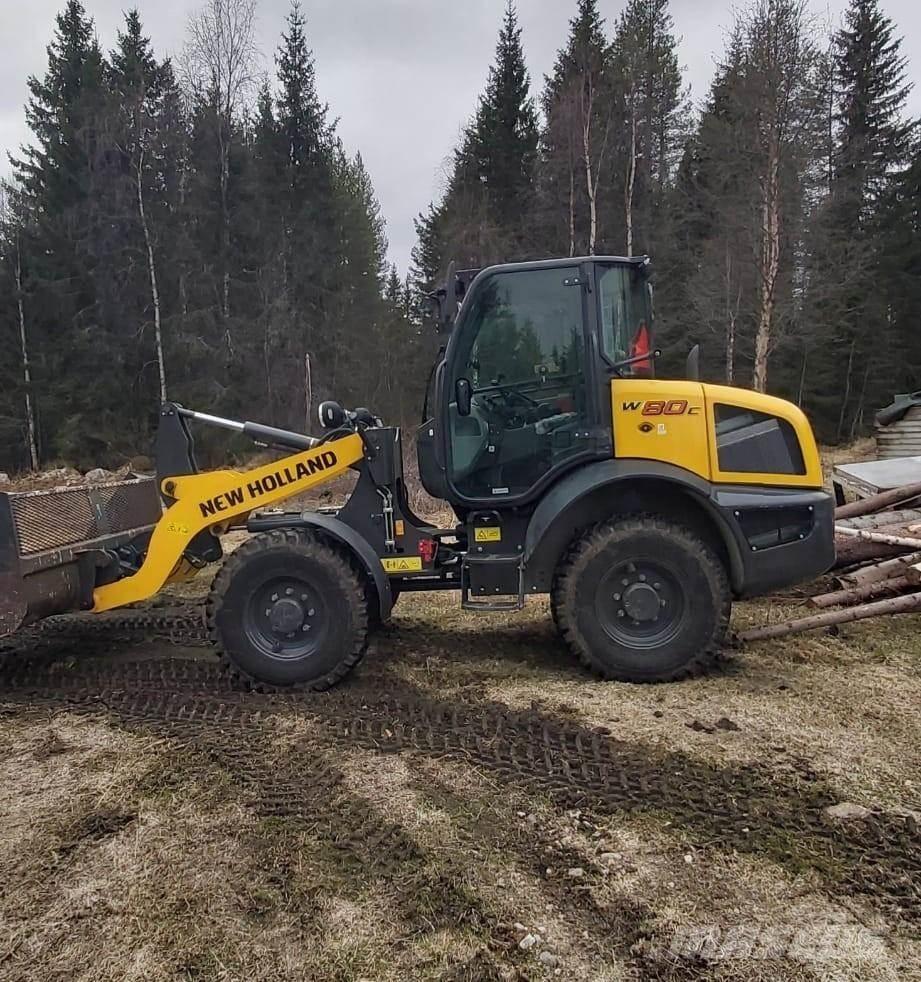New Holland W80C Gumikerekes homlokrakodók