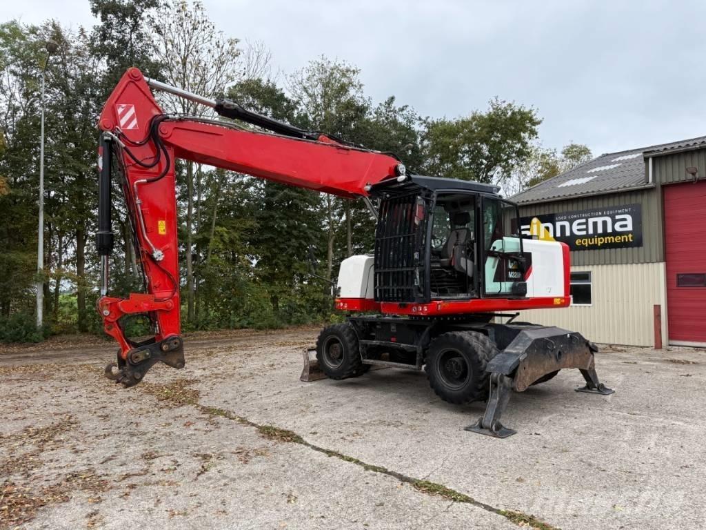 CAT M320F Gumikerekes kotrók