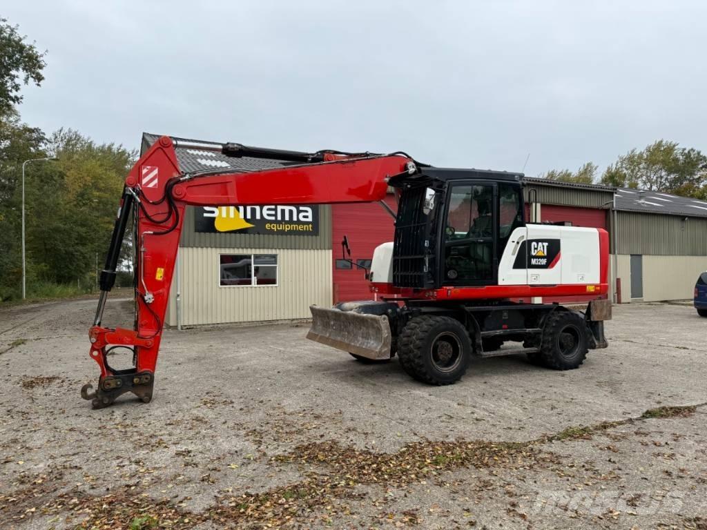 CAT M320F Gumikerekes kotrók