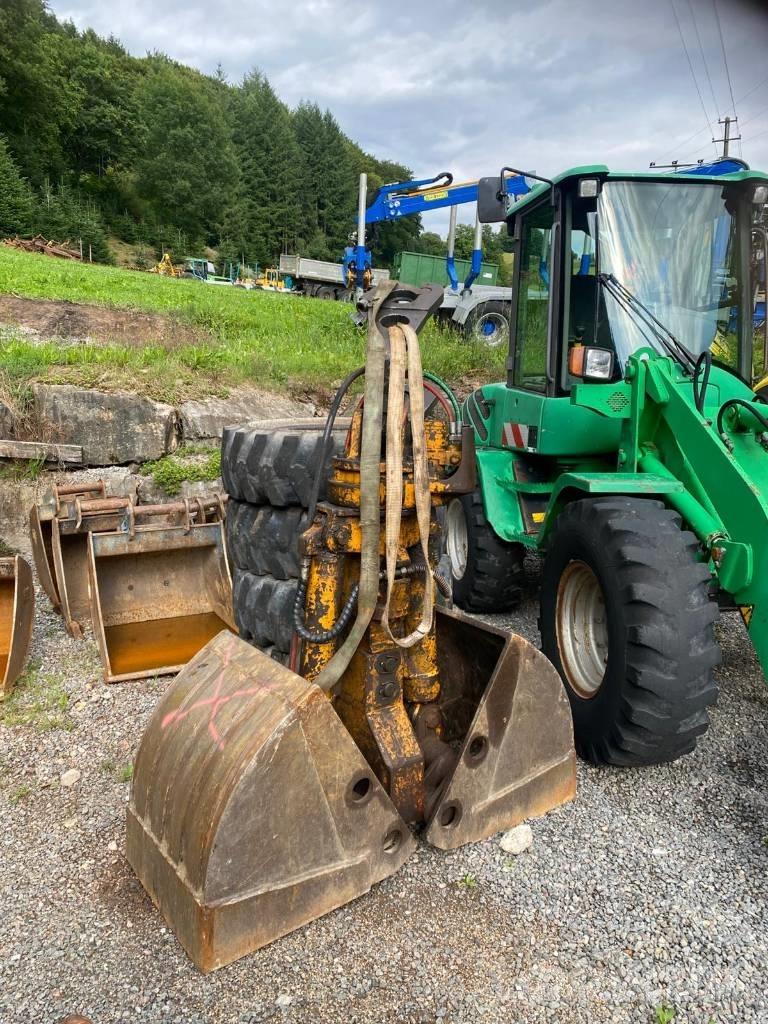 Hitachi ZX 140 W-3 Gumikerekes kotrók