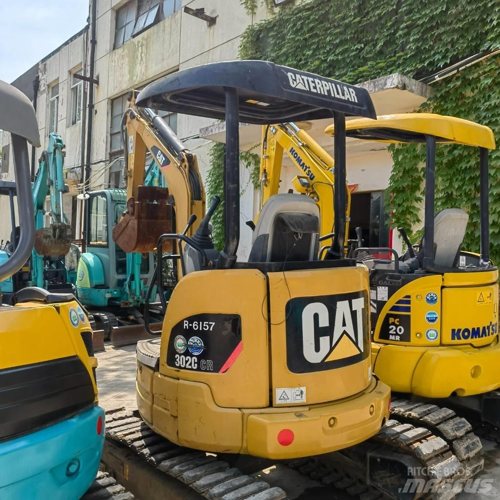 CAT 302 Mini kotrók < 7t