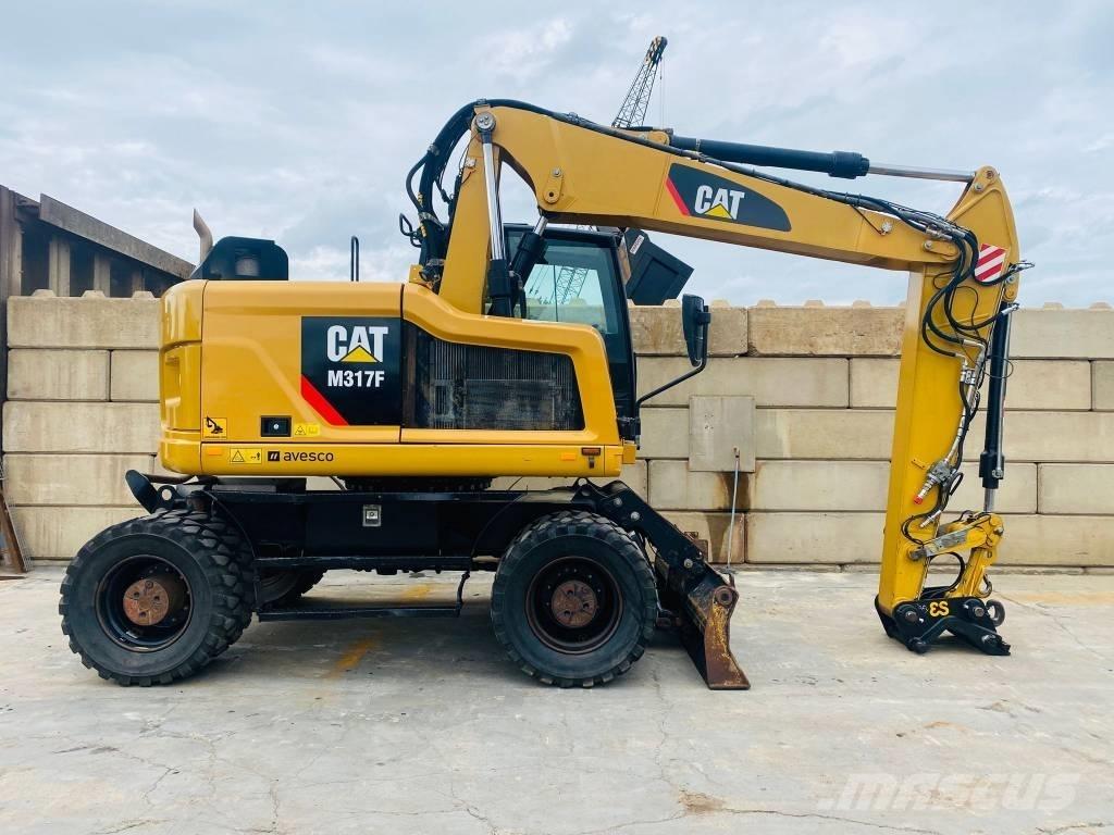 CAT m317f Gumikerekes kotrók