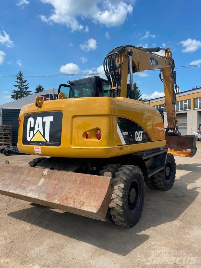CAT M 313 D Gumikerekes kotrók