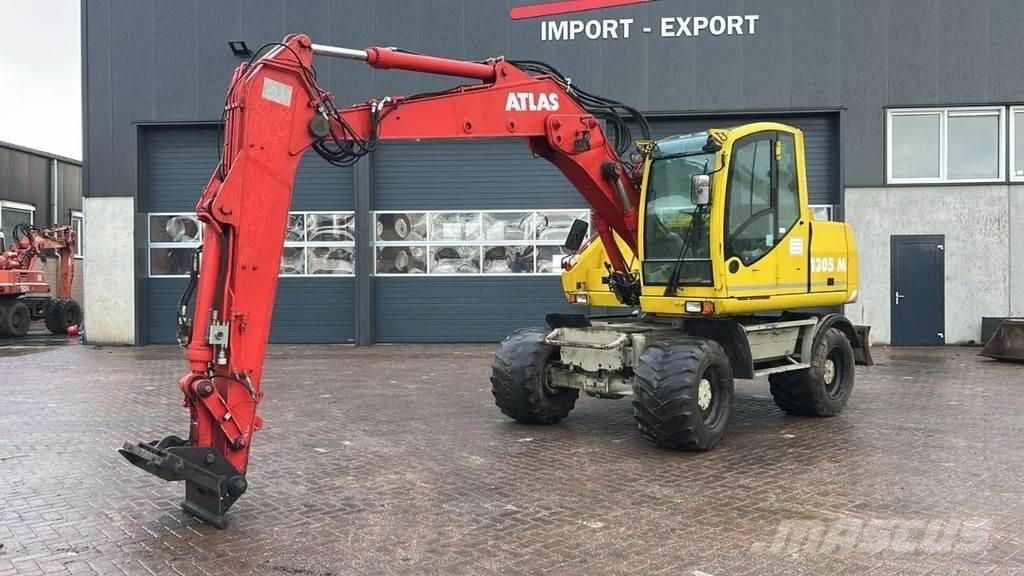 Atlas 1305 Gumikerekes kotrók