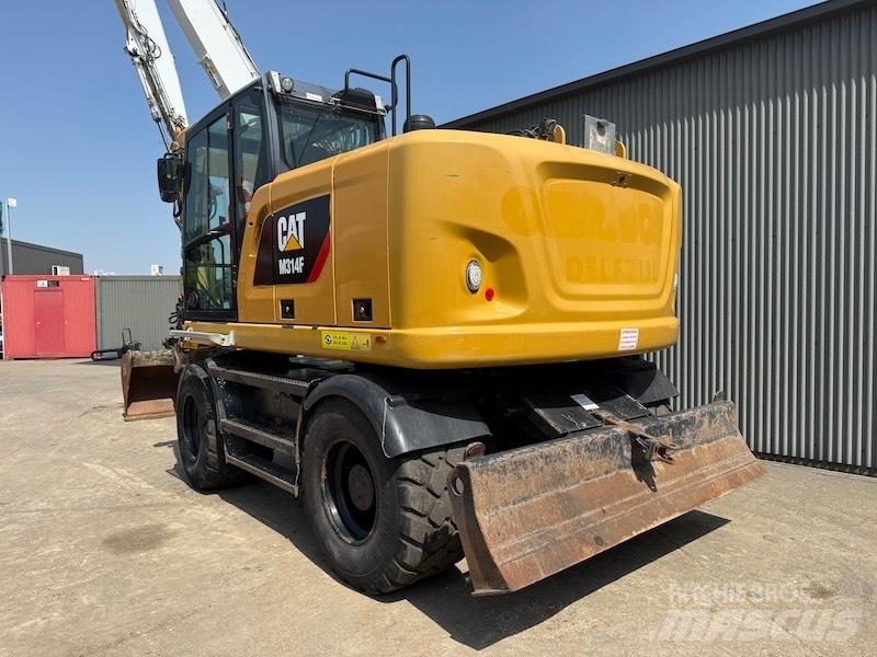 CAT M314F Gumikerekes kotrók