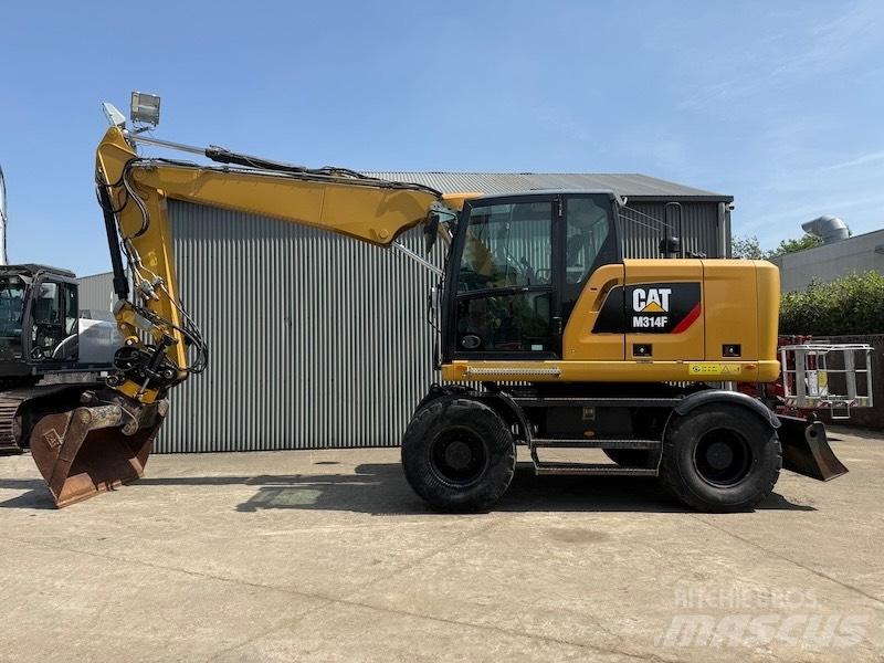 CAT M314F Gumikerekes kotrók