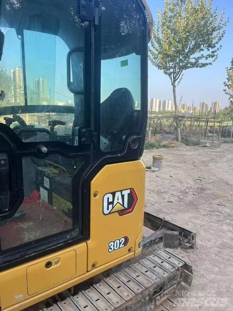CAT 302 Mini kotrók < 7t