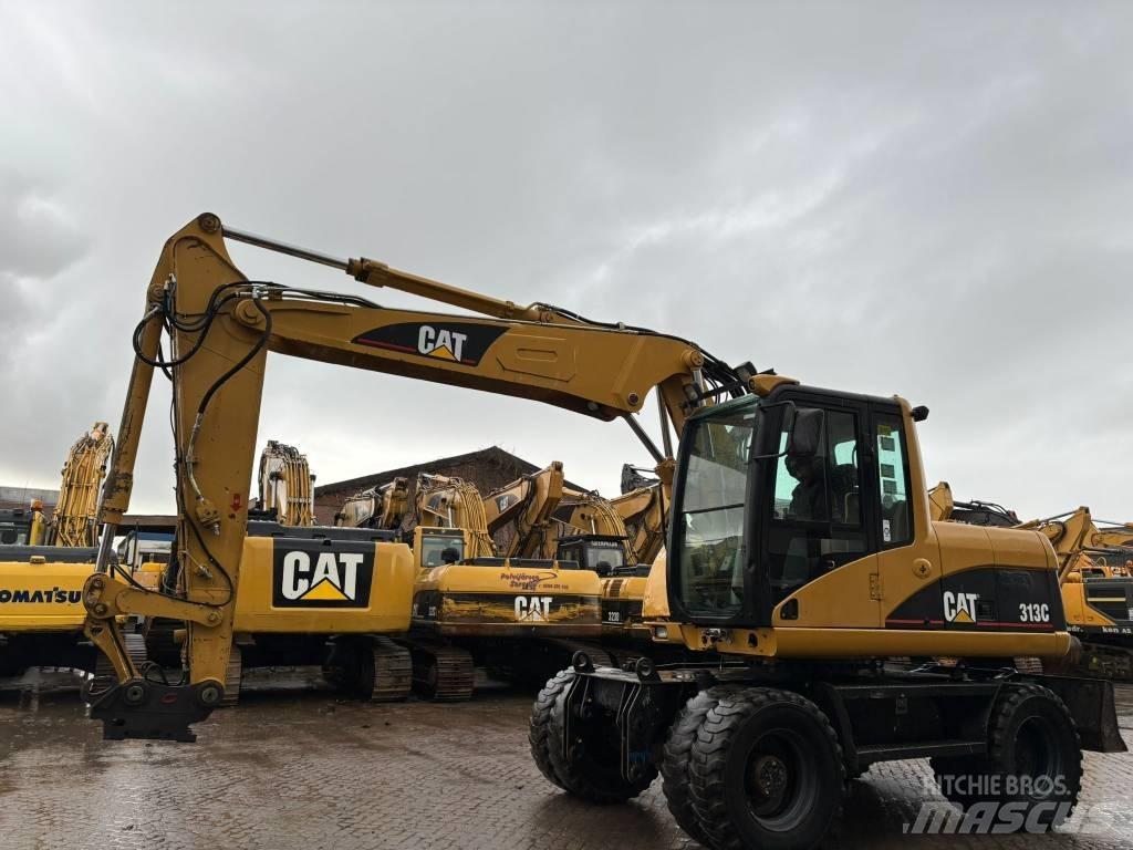 CAT M 313 C Gumikerekes kotrók